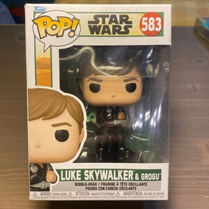 Funko Pop! #583 Disney Star Wars Luke Skywalker with Grogu​